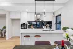  1/3 Lord Street Doncaster East VIC 3109 $950,000-$1,045,000 This newly constructed townhouse boasts four bedrooms and three bathrooms, epitomizing sophistication and top-tier qualitywith cutting-edge architectural design are located in the heart of Doncaster East and are certain to exceed your expectations and living conditions. They are very ideal because of their enormously roomy living areas, well-equipped kitchen, and highly desired location. Features include: Ground Floor: Spacious open-plan living and dining area leading to an airy east-facing terrace with tri-slide doors Stunning stone kitchen with a convenient window servery to the outdoor dining area, equipped with stainless steel appliances such as oven, 5-burner gas stove, and dishwasher, complemented by a mirrored splash-back Guest suite or secondary master bedroom with a fully-tiled ensuite and walk-in wardrobe Fully-tiled ensuite with a stone vanity, spacious frameless glass walk-in shower, and toilet Basement: Flexible space suitable for a gym, cellar, or storage room Separate laundry with stone benches, ample storage, and provision for a front loader washing machine Oversized double automatic garage with shelving and internal access First Floor: Two additional double bedrooms Impressive fully-tiled main family bathroom Expansive master bedroom with a fully-tiled ensuite, built-in wardrobe Additional Features: Zone ducted heating and reverse cycle ducted air conditioning Video intercom system Security alarm Elegant American Oak flooring and plush carpets Sleek tri-level design with high ceilings Situated in the sought-after school zones of Doncaster Gardens Primary School and Doncaster Secondary College, this property is conveniently located behind Jackson Court Shopping Centre, with easy access to Saints Peter & Paul's Primary School, parks, Devon Plaza, and bus routes to Westfield Doncaster and the city. 