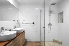  6 Scotsburn Court Mornington VIC 3931 $1,385,000 - $1,450,000 An evocative entertainer ready to meet the needs of growing families, this five-bedroom 3-lounge home grants a relaxed living experience across an interior rich in space and seclusion. Spread across an easy-care allotment of 1001sqm (approx.), a distinct entertaining-focus filters from front to back, crafting a foundation for true family fun. Immediately introduced to large-scale proportions, the home's three separate living zones open to the heart where a dining space and well-appointed kitchen holds attention with luxury stone benchtops, premium double-door cooker and expansive island bench. Matching indoor cooking facilities with a fully-fitted custom outdoor kitchen, a new benchmark in alfresco enjoyment presents alongside a sun-drenched deck, wood fired pizza oven, above-ground spa and easy-care garden. A collection of four junior bedrooms are introduced by a grand master suite where a dressing room and light-filled ensuite set a superior standard. Finished with premium craftsmanship and a commitment to quality inclusions, this grand family home comes complete with polished timber floors, split-system air conditioning, a separate studio with exterior access and a double garage amongst landscaped front gardens. Delivering a lifestyle of true family appeal, only moments from Bentons Junior College, Bentons Square, Mornington Main Street, local parklands and easy freeway access. 