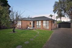  2 Barite Place Frankston VIC 3199 $650,000 - $715,000 Positioned in a highly sought-after locale in a family-friendly neighbourhood, this home offers unrivalled convenience, being just a short stroll from Karingal Hub's vibrant entertainment and shopping precinct, Karingal Heights Primary School, McClelland College, Ballam Park for all your sporting needs and easy access to the Peninsula Link. Nestled in a quiet cul-de-sac, welcome to this beautifully renovated three bedroom home where comfort and style converge seamlessly. Upon entry, you are greeted by a warm and inviting ambiance flooded with natural light and polished floorboards throughout before leading you into the generously sized living and dining area with split system heating/cooling. The renovated kitchen boasts chic subway tile splashback and marble benchtop complementing the modern aesthetic, while near new stainless steel appliances, including a dishwasher, electric cooktop and under bench oven unite for all of your culinary needs. Comprising three bedrooms, with the master featuring built-in robes, are all serviced by the updated central bathroom complete with a spacious shower and bath, and separate toilet for added convenience. The secure backyard offers the perfect space for children and pets to play freely before heading over to Lucerne Crescent Reserve for further play or tranquil picnics. Boasting the added advantage of a single lock-up garage and additional off-street parking, indulge in a lifestyle of unparalleled convenience in this family-friendly home that is certain to captivate both first-time homebuyers and savvy investors. 