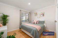 38 Stirling Cl Swan View WA 6056 $799,000There is much to love in this five-bedroom, two-bathroom home – and the sweep of city views from the upstairs bedrooms and poolside deck are top of the list. Multiple living spaces, a modern family-centric kitchen and meticulously maintained gardens with automatic reticulation are all nestled within a secluded foothills location, offering tranquillity and effortless connectivity to Midland and beyond. This impeccably maintained and ideally positioned family home seamlessly blends comfort and convenience. 5 Bedrooms 2 bathrooms 1979-built brick and tile Spacious open-plan living Light-filled formal lounge Family-focussed kitchen Pool and decked alfresco Dual drive and dbl garage Sweeping city skyline views 750 sqm cul-de-sac block Minutes to Trail and JFNP A tidy front yard leads to the east-facing front veranda with a double garage at one end. The front door opens into a luminous, tiled floor lounge with an east-facing window. A light, neutral palette is employed across the home to ensure unity and underline the spacious, flowing interiors. The easy flow across the ground floor layout continues in the central open plan at the heart of this family home. The central living zone, in turn, blends into the poolside alfresco entertaining area. With ample room for family-sized sofas and dining tables, the central living zone boasts a generously proportioned kitchen with a wide benchtop and integrated breakfast bar, a 900 mm oven and cooktop and a 2-drawer dishwasher. Under bench storage and a walk-in corner pantry complete the bright, practical kitchen. Three bedrooms – a principal and two juniors – a modern family bathroom with a spa bath and a walk-through laundry complete the ground floor layout. The main bedroom boasts a walk-in robe and both juniors have built-in robes. A carpeted staircase ascends to the first floor and two carpeted bedrooms with city views to lull you to sleep. These rooms have access to a chic modern bathroom with a shower, vanity and WC. The first-floor rooms are kept comfortable thanks to ducted evaporative cooling – a split system is fitted on the ground floor. French doors lead to a private courtyard garden on one side of the home. A sliding glass door opens to the gable-roofed outdoor entertaining zone with an elevated deck at one end, delivering stunning city skyline views and the perfect spot for sunset cocktails. Compact, impeccably landscaped and private, the fully fenced backyard features a crystal clear below-ground pool, a walled lawn/ garden and a shed. A roller door in the rear of the garage provides easy access to the backyard. Steps from the Heritage Trail, where kilometres of walking and riding await, within easy reach of the natural beauty of John Forrest National Park and ideally positioned for easy access to arterial road links and public transport, this generous home will top the list of families seeking comfort and convenience. 