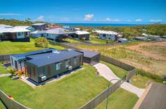  20 Occhilupo Circuit Agnes Water QLD 4677 $669,000 Welcome to 20 Occhilupo Circuit, Agnes Water! This stunning 2 bedroom, 2 bathroom house is the perfect coastal retreat. With a spacious living area, modern kitchen, and outdoor entertaining deck, this property is ideal for those who love to entertain or simply relax in the serene surroundings. The property features a swim spa, plantation shutters, and a water tank for eco-friendly living. The backyard is fully fenced, making it a safe space for pets or children to play. Offering dual entry and a double garage which provides ample storage for vehicles or outdoor equipment. Located in a quiet and family-friendly neighborhood, this property offers the perfect blend of comfort and convenience. Don't miss out on the opportunity to make this house your home. 