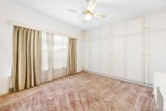  11 Edie Street Mansfield Park SA 5012 $650,000 Situated in a quiet street on a prized allotment of some 636m2 this classic 60's solid brick home offers so much potential and will appeal to first home buyers, family buyers or investors. Move in and enjoy 'as is 'or renovate and extend at your leisure. Comprising four generous size bedrooms, master bedroom is exceptionally large and together with two other bedrooms complete with built-in-robes. Light-filled lounge with big picture windows and sandstone fireplace surrounds and separate spacious dining adjacent the cool retro galley style kitchen. A striking terrazzo bathroom in mint condition and complete with full bath, shower recess and vanity, plus there is a separate WC and large laundry. Step outdoors to the rear verandah and a large yard that offers so much scope. Reinstate the yard back to a thriving sustainable garden and room for chooks, and there is room for a pool, an extension or plenty of space for children and pets to run freely. Looking for an impressive workshop, then this 33m2 brick shed with concrete floor, power and lighting will appear to car enthusiasts, handy persons or could easily be converted to a studio or a rumpus room. You are spoilt for choice as there is also another large shed at the rear. Additional features we love; - Front Window shutters - Secure carport for 3 cars - Split system air-conditioning unit - Security alarm system - Security front and back doors - Private and secure - 2 x Ceiling Fans - Floorboards under the carpets - Rinnai gas hot water service Positioned in this highly sort after location with the Frederick Street Reserve just metres away, easy access to the North South Motorway and only 12 kms to the Adelaide CBD. Great shopping facilities close by with either Arndale Shopping Centre or the Churchill Centre. Regency Park Golf Course, The Parks Recreation and Sports Centre. A choice of good public and private schools, Zoned to Woodville Gardens Primary and Woodville High and a short stroll to St Patrick 's Primary School. 