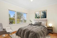  24 Hilltop Avenue Wollongong NSW 2500 $1,150,000 - $1,250,000 Spacious, soothing and lit up with sunshine, this three-bedroom home certainly delivers on its promise of comfort and convenience. It offers picturesque ocean and escarpment views. You'll be pleased to discover an inviting home that'll appeal to homebodies and entertainers alike: high ceilings, floorboards throughout, a workshop for hobby/DIY enthusiasts, an office that can provide a sanctuary for WFH professionals and a compact kitchen with ample storage. Set on an 837 sqm block; the oversized fully-fenced backyard has plenty of space for outdoor gatherings, for the kids to play, pets to roam. Families, renovators, and investors will enjoy making this home their own. There is plenty of potential to breathe new life into the property, which is close to Figtree Grove, Wollongong CBD, local eateries, public transport, and several primary and high schools. Features - Split system A/C in living, bedroom - Solar panelling, secure alarm system - Oversized backyard, ocean + escarpment views - Renovator / development potential (STCA) - Workshop, office, prime location 