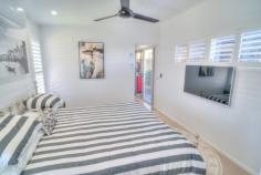  20 Occhilupo Circuit Agnes Water QLD 4677 $669,000 Welcome to 20 Occhilupo Circuit, Agnes Water! This stunning 2 bedroom, 2 bathroom house is the perfect coastal retreat. With a spacious living area, modern kitchen, and outdoor entertaining deck, this property is ideal for those who love to entertain or simply relax in the serene surroundings. The property features a swim spa, plantation shutters, and a water tank for eco-friendly living. The backyard is fully fenced, making it a safe space for pets or children to play. Offering dual entry and a double garage which provides ample storage for vehicles or outdoor equipment. Located in a quiet and family-friendly neighborhood, this property offers the perfect blend of comfort and convenience. Don't miss out on the opportunity to make this house your home. 