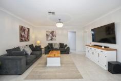  10 Olney Ct High Wycombe WA 6057 $789,000 Tucked away at the end of a quiet cul-de-sac street, this immaculately presented four bedroom two bathroom home has all the creature comforts and is ideally located for quick access to both the Roe and Tonkin Highways and just 10 minutes to Perth Airport. Features include: • Elevated aspect from street • Contemporary open-plan design • Stylish neutral decor throughout • Beautiful kitchen with ‘Essa-stone’ bench-tops • Quality kitchen appliances incl ‘Westinghouse’ and ‘Smeg’ • Spacious walk-in pantry • Separate lounge or theatre room • All bedrooms at least queen size with built-in robes • High quality bathrooms with ‘Essa-stone’ vanity tops • Impressive master suite with ‘his n hers’ walk-in robes • Large master ensuite with twin vanity basins • ‘Fujitsu’ ducted reverse-cycle air-conditioning throughout • 6.6kw ‘Solar’ solar electric system • Electronic security system • High quality light fittings and window treatments • Plantation shutters in open-plan area • Double auto lock-up garage with 3rd parking bay • Impressive alfresco outdoor entertaining with feature lighting & misters • Tinted windows on west side for afternoon sun • Garden shed plus storage in garage • Fenced and reticulated front lawn and gardens • Easy-care 465 sqm block • 174 sqm internal living plus garage and alfresco • A short distance to local shopping centre and schools 