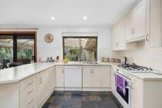  22 Osmanli Dr Hallett Cove SA 5158 $850,000 to $895,000 With a north-facing frontage on the high side of the road just 100m from Waterfall Creek and walking trails, this spacious family home will appeal to many. From the entry you'll find easy access to a huge front living space complete with built-in bar and gas wood log fire, and an equally sizeable adjoining family or games room with northerly light and sliding door onto the alfresco. A neat neutral kitchen lined with slate floors offers shaker-style cabinetry, gas cooktop, double sink, dishwasher and plenty of working and storage space to chefs of the house, an adjacent skylit dining area with sliding doors opening onto an expansive paved outdoor entertaining space under the protection of a pitched roof pergola. Adding a tranquil backdrop is a fernery and shade garden, while a generous lawn space bordered with established greenery completes the backyard. Up to four bedrooms (or three plus a study/home office) include a roomy master with built-in robes, ceiling fan and beautiful natural light overlooking the landscaped front gardens, each serviced by a central main bathroom with shower, inset bath and separate powder room. Delight in the details: - Ducted reverse cycle air conditioning throughout - Solar panels - Wide driveway with double lock-up carport + drive-through access to extra parking space - Separate laundry + linen storage - Low maintenance manicured front yard with artificial lawn - Rear garden shed with power Reserves, schools and early learning centres are within walking distance, with easy access to Hallett Cove Shopping Centre, bus and train transport and the beach, just a touch over 20kms from the CBD. 