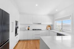  12A Foster Road Flinders NSW 2529 $1,150,000 Welcome to your dream home nestled in the heart of Flinders. This exquisite Torrens-titled home seamlessly blends contemporary design with functional luxury, offering an unparalleled living experience. Aesthetically pleasing from every angle, the property boasts a thoughtfully designed floor plan that maximizes space and natural light. With four generous bedrooms, including a luxurious master suite with walk-in robe/en-suite and a living room on each floor, there's ample space for the whole family to live and grow comfortably. The stylishly renovated kitchen showcasing new premium appliances and 40mm stone bench tops. Meticulously built with attention to detail by a local boutique builder, this home boasts impeccable construction, ensuring durability and longevity. With polished timber flooring, new paint and carpet throughout, all of the bathrooms recently updated all that's left to do is move in and enjoy all this stunning property has to offer. Host unforgettable gatherings in the spacious outdoor living areas with your choice of two enormous balconies boasting some of the best views in Flinders. Close to: Shell Cove Marina Precinct 2.3km Shellharbour Junction Train Station 2.1km Shellharbour Village 2.5km Flinders Public School 1.2km Freeway Access 1.8km 