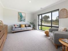  27 Freeman Cr Baranduda VIC 3691 $749,000 Set in the display village of Avalon Park Estate, this display home with a parkland outlook encompasses a contemporary living design with a modern yet neutral colour palette. If you’re in the market to build a low maintenance home but don’t look forward to the task at hand, then this complete turnkey package should certainly be on your list to inspect. Offering four bedrooms, the private master suite features a two way walk through robe and tasteful ensuite with dual basins that is cleverly concealed behind a feature barn door. A further three bedrooms all with built in robes are located to the rear of the home and serviced by the full family bathroom. Multiple living options include a separate formal lounge to the front of the home that receives an abundance of natural light and an open plan kitchen, living and dining arrangement which seamlessly connects to the alfresco for those that love to entertain. The designer kitchen is the core of the home and boasts the big ticket items your looking for including stone benchtops, extensive island bench, gas cooktop, electric oven and generous butlers pantry complete with sink and dishwasher. Sliding doors provide functional indoor-outdoor flow to the covered alfresco, perfect for gatherings or simply to relax in whilst overlooking the low maintenance and secure yard. Additional features include a double garage with both remote and internal access, ducted heating and evaporative cooling for your year round comfort, window furnishings throughout and full laundry facilities with built in linen closet. Within walking distance to children's playgrounds, schooling, sporting facilities and the recently completed IGA, you have all you need to sustain a low maintenance and convenient lifestyle. We welcome your inspection and enquiry. 