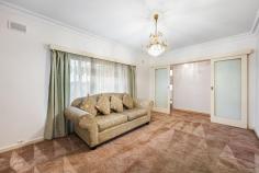  11 Edie Street Mansfield Park SA 5012 $650,000 Situated in a quiet street on a prized allotment of some 636m2 this classic 60's solid brick home offers so much potential and will appeal to first home buyers, family buyers or investors. Move in and enjoy 'as is 'or renovate and extend at your leisure. Comprising four generous size bedrooms, master bedroom is exceptionally large and together with two other bedrooms complete with built-in-robes. Light-filled lounge with big picture windows and sandstone fireplace surrounds and separate spacious dining adjacent the cool retro galley style kitchen. A striking terrazzo bathroom in mint condition and complete with full bath, shower recess and vanity, plus there is a separate WC and large laundry. Step outdoors to the rear verandah and a large yard that offers so much scope. Reinstate the yard back to a thriving sustainable garden and room for chooks, and there is room for a pool, an extension or plenty of space for children and pets to run freely. Looking for an impressive workshop, then this 33m2 brick shed with concrete floor, power and lighting will appear to car enthusiasts, handy persons or could easily be converted to a studio or a rumpus room. You are spoilt for choice as there is also another large shed at the rear. Additional features we love; - Front Window shutters - Secure carport for 3 cars - Split system air-conditioning unit - Security alarm system - Security front and back doors - Private and secure - 2 x Ceiling Fans - Floorboards under the carpets - Rinnai gas hot water service Positioned in this highly sort after location with the Frederick Street Reserve just metres away, easy access to the North South Motorway and only 12 kms to the Adelaide CBD. Great shopping facilities close by with either Arndale Shopping Centre or the Churchill Centre. Regency Park Golf Course, The Parks Recreation and Sports Centre. A choice of good public and private schools, Zoned to Woodville Gardens Primary and Woodville High and a short stroll to St Patrick 's Primary School. 