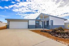  4 Parakeet Bend Jurien Bay WA 6516 $638,000 PROFESSIONALS JURIEN BAYVIEW REALTY are proud to present this comfortable family home in the Beachridge Estate. It offers 3 bedrooms, 2 bathrooms and an office off the open plan living/dining area. The kitchen features stainless steel appliances and is really spacious. The master bedroom features a dressing room and an ensuite and there is sliding door entry to the rear yard. The home is currently tenanted till August 2024. 