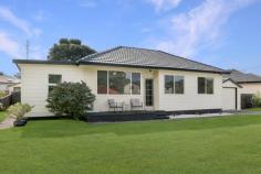  22 Lakelands Drive Dapto NSW 2530 $750,000 - $790,000 Welcome to this exquisite 4-bedroom home, where modern elegance meets timeless charm. Step inside to discover high ceilings adorned with ornate cornices, adding a touch of grandeur to every room. The recently modernized interior boasts a brand new kitchen featuring 40mm benchtops, a sleek glass splashback, and the convenience of a dishwasher. The modern bathroom, complete with a second toilet in the laundry, offers both style and functionality. Entertain guests effortlessly on the expansive covered entertainment area, perfect for alfresco dining or relaxing in the fresh air. Situated on a level 658m2 block, this property includes a convenient drive-through garage and additional storage sheds for all your storage needs. Enjoy the proximity to parks, playing fields, and easy freeway access, making this home the epitome of comfort, style, and convenience. HIGHLIGHTS • 4 bedrooms • Modern kitchen with glass splashback and dishwasher • High ceilings with ornate cornices • Modernised bathroom with second toilet in laundry • Covered entertainment area • Drive through garage and sheds • Level 658m2 block • Close to parks and playing fields • Close to freeway access 