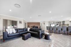  21 Basile Court Wandina WA 6530 $880,000 Welcome to 21 Basile Court, Wandina, where the striking brickwork welcomes you home at any time of the day. This home is definitely for anyone who values the Free Form Living design, and here you will be impressed. The builder has used quality fixtures and fittings, and with the owners' input, you will have a home that feels good inside. It boasts a tranquil, peaceful feeling and offers an exceptional lifestyle with generous spaces designed for those who love to entertain and enjoy ocean views. The kitchen, with its clean lines and natural surfaces, is a room you'll love being in. You'll greatly appreciate how you can stay engaged in food preparation and socializing with a breakfast bar that seats 6. While filled with every amenity needed for everyday cooking, you will love the connectivity to a full alfresco kitchen. You will be pleased to see that the bedrooms are all generously sized. The spacious main bedroom has a casual elegance and is situated to afford privacy from the minor bedrooms. The home theatre with surround, could also be turned into a wonderful fourth bedroom if required. The ducted zonal conditioning unit gives you different temperatures in all rooms. No arguments here. The built-in bookshelves and display shelves are perfect for those who appreciate a place for everything. Situated on a generous 905m2 block of land, this property boasts a building area of 270m2, offering plenty of space for additional storage. With a price guide of $880,000, you are welcome to contact us today to arrange a viewing of this unique residence defined by its openness and complemented by its touch of luxury combined with functionality. A viewing is highly recommended for a true appreciation of the home and the outside storage. 