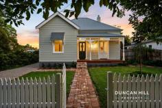  49 Victoria St Bowral NSW 2576 Indulge in the allure of this meticulously renovated weatherboard cottage, where every detail has been carefully crafted to create a charming residence. Situated in Old Bowral, a level walk to the high street, and next to the Cherry Tree Walk, its location is second-to-none. The perfect place for those looking for an elegant Southern Highlands retreat. We extend a warm invitation for you to immerse yourself in the history and splendour of this exceptional home. Features include: Heat & Glo gas fireplace with mantle Ducted central heating High ceilings Hardwood timber floors Eat-in kitchen featuring stone benchtops, shaker cabinetry, ILVE 90cm freestanding cooker, Westinghouse integrated rangehood, farmhouse kitchen sink, Westinghouse dishwasher and Masport freestanding wood fire Marble bathroom vanity bench top Clawfoot bathtub Landscaped front yard Garden shed Fully fenced  Covered outdoor entertaining area 