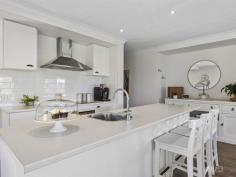 30 Rees Road Jumbunna VIC 3951 $1,175,000 Escape to the serene countryside at 30 Rees Road, Jumbunna, where each day begins with awe-inspiring sunrises painting the sky over the picturesque rolling hills. This expansive 2.71 acre / 1.1 ha* property with modern ranch style home awaits beyond entrance wood gates and a tree-lined driveway. This home boasts: • Expansive open plan living areas, seamlessly blending kitchen, dining, and lounge spaces for relaxed living and effortless entertaining. • A gourmet kitchen complete with a butler's pantry, deluxe 900mm oven, electric hot plate, dishwasher, breakfast bar, and ample storage, perfect for culinary enthusiasts. • Outdoor entertaining at its finest with a covered alfresco area offering year-round enjoyment. • Enjoy cozy evenings by the Euro Fireplace or stay cool in summer with the reverse cycle air conditioner. • Four bedrooms, each featuring walk-in robes, including a luxurious master suite with a double shower ensuite, providing a peaceful retreat. • A family bathroom featuring a bath, vanity, shower, and separate toilet, catering to both comfort and convenience. • Practical touches include a laundry with direct access from the double garage, ensuring functionality and ease of living. External highlights: • Embrace the simplicity of a low-maintenance lifestyle with pony paddocks (5), a chook house with run, and flourishing vegetable plots. • Ample storage and workspace in the impressive shedding, including a 10m x 9m Barn with power and office room. • Water security with a capacity of 62,000 litres and sustainable living with a 6.2KW Solar System (installed in 2022), promising significant energy savings. • Expansive grounds offer endless opportunities for garden expansion, outdoor recreation, and embracing the joys of country living. Jumbunna is nestled in the rolling hills of South Gippsland, conveniently located 5 minutes from Korumburra, 15 minutes from the beaches of Inverloch, 18 minutes to Leongatha and an easy 90minutes into Melbourne. Don't miss out on the opportunity to make 30 Rees Road, Jumbunna, your new home and wake up to the beauty of every sunrise. 