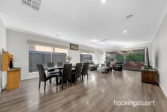  4 Greyfriars La Wollert VIC 3750 $700,000 - $750,000 A world of modern refinement and family-centric 4 Bedroom home, with two living spaces ensuring no shortage of room for family gatherings, relaxation or entertaining. A kitchen features gas cooking, a dishwasher, a walk-in pantry and a thoughtfully placed laundry, providing every culinary essential at your fingertips. Shifting life outdoors, glass sliding doors give access to the covered decked alfresco, offering a spacious outdoor entertaining area ideal for alfresco living and an easy-care yard primed for kids to play.   This remarkable house features :-   - Master Bedroom with ensuite shower, stone benchtop and walk-in robe - Other additional Bedrooms with built-in robes. - Central Bath with bathtub, shower and vanity. - Heaps of storage space with walk in linen. - Butler's Pantry - Quality fittings - Remote-controlled Double Garage - Heating and Cooling. - Open living and dining area. -  Stylish Kitchen with 900mm Cooktop and rangehood - Dishwasher - Splashback in the kitchen. - High Ceilings and High Doors - Waterfall Stone Benchtop in kitchen, bathrooms  - High-quality Fixtures and Fittings throughout. - Low-maintenance landscaped front and rear yards . -Impressive Facade It is an address perfectly positioned for convenience and growth. A place where you will take pride in your community and where your neighbors will become your friends. 