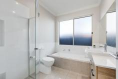  8A Talbot Grove Marryatville SA 5068 $1,100,000-$1,200,000 Boasting perfect placement in the heart of the leafy east, a bespoke design by D'Andrea Architects, and construction by award-winning Zee Homes, 8a Talbot Grove is the embodiment of elevated living. High on impact while low on maintenance, it's an enviable next step, no matter your plan. Rich red brick and sleek render front a floorplan defined by extensive open-plan living area, panoramic windows and northern orientation ensuring no shortage of natural light. Sleek oak-toned floors sweeps across a gourmet kitchen, stone-topped island bench connecting all zones for seamless flow, while a full suite of stainless-steel appliances, gas cooktop, and corner pantry unite to create a worthy workspace for chefs of all commitment levels. Sliding doors integrate indoors and out, gliding to pitched roof pergola, your alfresco hub for everything from quiet moments of contemplation to extended family brunch, delivering the ultimate easy-care outdoor area for zero downtime scarified to excessive garden care. Bookended by walk-in robe and luxe ensuite, a generous main bedroom provides an exceptional retreat to start and end the day. Tucked privately in their own wing, two additional spacious bedrooms are each complete with built-in robes, fully serviced by a family bathroom with contrast tiling, corner shower and ultra-wide vanity ready to host rush hour with ease. In a simply unmatchable location, it's a short walk to Tusmore and Hazelwood Parks for summers spent poolside or perfecting your backhand, while Burnside Village, Kensington Road and Norwood Parade place endless retail and vibrant nightlife close by. Only a 10-minute drive to the CBD, with zoning for Marryatville Primary Schools and a short walk to Marryatville High School, plus your pick of Adelaide's finest private schools in close radius for a streamlined commute and school run. Everything that makes the eastern suburbs so coveted wrapped up in a truly impressive package - you'll never look back. More to love: - Private rear placement in small group of four - Solar panel system - Secure double garage with interior and rear pedestrian access - Separate laundry with external access - Ducted, zoned reverse cycle air conditioning throughout - Security system - LED downlighting - Rainwater tank 
