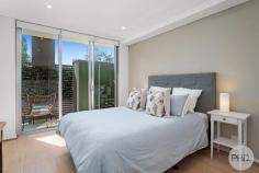  1 / 6 Bullecourt Street Shoal Bay NSW 2315 Nestled just a leisurely 170 metres from the crystal-clear waters of Shoal Bay Beach, this exquisite ground floor unit with its own private entrance epitomizes coastal elegance and effortless living. Designed as a serene retreat, it's an idyllic haven for those seeking a lock-and-leave weekender or a low-maintenance lifestyle amidst the beauty of the beach. Upon entering, you are greeted by a luminous and airy interior, bathed in natural light and complemented by a soothing coastal colour palette and chic light timber flooring. The open-plan kitchen and dining area is a culinary delight, showcasing modern sophistication with its sleek white cabinetry, pristine stone benchtops, and stylish breakfast bar, creating a harmonious space for both cooking and entertaining. The unit offers two generously proportioned bedrooms, with the main bedroom indulging you with the luxury of a walk in wardrobe and ensuite, is a private sanctuary for relaxation. The main bathroom mirrors the unit's modern aesthetic, offering a spacious and elegant retreat for pampering and rejuvenation. Outside, the fenced courtyard is a tranquil oasis, providing a secluded space to enjoy alfresco dining, morning yoga, or simply basking in the gentle sea breeze. Situated in an enviable location, the unit offers unparalleled convenience, with the beach, local amenities, and attractions all within easy reach. Immerse yourself in the vibrant coastal lifestyle of Shoal Bay, where every day feels like a holiday. Don't miss this rare opportunity to embrace the quintessential beachside lifestyle in this impeccably designed and thoughtfully appointed unit. Experience the epitome of coastal living at its finest.  