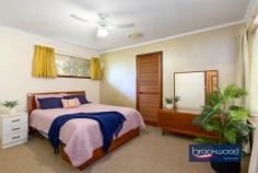  1 Darlington Rd Darlington WA 6070 $549,000 The surprise and delight of this spacious duplex with a flowing floor plan and large backyard make it a compelling opportunity to gain a foothold in the Perth Hills. The neat home sits on an elevated block looking out to a nature reserve, a situation that delivers a daily dawn chorus courtesy of the abundant bird life. Subtle 70s features, an idyllic location, a corner block and a no-fee duplex with a garage combine in an exceptional property. 3 beds 1 bath 2 WC Brick & tile duplex Spacious bedrooms Flowing floorplan OP Kitchen/meals E-facing verandah Expansive backyard Garage w shoppers 1339 sqm crn block A rare opportunity The front door opens into a comfortable, well-proportioned lounge room with a picture window framing classic Hills’ views from its elevated position. A sheltered front porch offers a similar perspective and the perfect spot for morning coffee. A clinker brick feature wall introduces a touch of 70s authenticity and partially separates the lounge from the open-plan kitchen/meals area. The meals area has ample room for a table, and the kitchen is defined by a worktop and integrated breakfast bar atop under-bench cabinets. An electric oven, grill, and hotplates ensure a functional space with plenty of room to cook up a storm. A sliding door leads from the meals area to the shelter of the large back verandah and yard.  A door from the kitchen opens into a spacious walk-through laundry with built-in storage, a separate WC and a shoppers’ entry to the single garage. The family bathroom and three bedrooms are arranged at the north of the plan. The front and rear bedrooms are generously proportioned with built-in or walk-in robes, carpet and ceiling fans. The bedroom at the front of the plan boasts a picture window framing aspects of the garden and reserve. The rear bedroom looks out to the backyard. The family bathroom has a shower tub, vanity, and WC. The home’s garage opens directly into the laundry – a practical and surprising feature in a duplex unit of this vintage. This home sits on over 1339 sqm of land, with the potential for a second access point from Mitchell Road. Approval of the additional access could, in turn, allow for the construction of a workshop or storage space for a caravan or boat. This duplex feels like a detached home and represents an ideal proposition for first-home buyers wanting to get a foot in the Perth Hills or downsizers who still want to have room to garden and space for visitors. 
