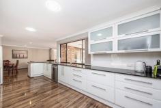  16 Fletcher Road Lesmurdie WA 6076 $989,000 Set in this PEACEFUL & QUIET location overlooking beautiful Seaton Park (with its pretty creek, walk trails, playground), is this beautifully renovated & immaculately kept 4-bedroom 2-bathroom brick home on a MINIMAL CARE & fully landscaped 1,503m² block. Featuring 2 separate living areas, a galley-style kitchen with granite bench-tops & generous cupboard storage spaces, good-sized bedrooms, a massive alfresco area complete with a built-in barbeque area & fire pit, this gorgeous property will suit a myriad of buyers: Those who love to entertain - huge alfresco area and the landscaped gardens provide a beautiful backdrop for those larger parties / family gatherings; The young family - plenty of lawned area for the kids to play and there is also the playground across the road! The family with older kids - the master bedroom is conveniently located at opposite ends of the house from 2 other bedrooms, with parking space for additional cars. The downsizer - for those of you looking to downsize to a smaller & easy-care block but not wanting to compromise on the size of the house. There is absolutely no work required here - just move in and enjoy all that this gorgeous property has to offer. So call Emily Tan or Angela Padula now to view & secure this gorgeous property! Property Highlights: beautiful timber-look flooring 4 great-sized bedrooms 2 bathrooms formal lounge overlooking the park open-plan family, dining & kitchen galley-style kitchen with granite tops, dishwasher, 900mm oven & pantry massive alfresco area shaded area at the front of the house for relaxing & enjoying park views reverse-cycle air-conditioning slow-combustion wood heating a 3.85kW photovoltaic system (solar panels) security system 3 garden sheds landscaped & terraced backyard with built-in fire pit & seating double garage (with extra height clearance) additional parking space for a caravan or boat 1,503m² minimal care block great central location, within an easy walk to shops and public transport, and close to local schools including St Brigid's College and Kalamunda Christian School approximately 15km to Perth airport and 25km to Perth CBD 