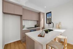 33 Tarranna Ave Plympton Park SA 5038 $797,500- $820,000 Torrens Titled with a street frontage position along the tree-lined Tarranna Avenue, this brand-new courtyard home is super sleek from start to finish. A crisp white façade with timber accents offers instant street appeal before a front porch entry opens to reveal a central hallway lined with timber floors. Enjoying front position and a lovely street outlook, a comfortable master bedroom is complete with a walk-through robe and beautiful ensuite bathroom with floating vanity and full-height tiling. A further two bedrooms are serviced by a spacious main bathroom with deep freestanding bath, shower and large vanity. Open, airy and flooded with natural light, a north-facing kitchen, dining and living space is warm and welcoming, arming home cooks with a large gas cooktop, plenty of storage space and an island with dishwasher, breakfast bar and double undermount sink. Sliding doors open onto a private, easy-care courtyard with lawn strip and side access. Delight in the details: - Ducted reverse cycle air conditioning - Built-in robes to bedrooms 2 & 3 - Separate laundry with linen storage - Secure single garage with internal access + extra off-street parking Walk to Cowra Crescent Reserve, the bus, takeaway options and local shops, while the train, schools, Edwardstown Oval and Castle Plaza and Westfield Marion Shopping Centres are within easy reach. City commutes are simple, and the sparkling shores of Glenelg are within 5kms. 