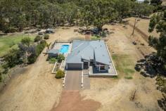 29 Adams Road Red Hill WA 6056 $1,450,000 Here's your opportunity to live an idyllic semi-rural lifestyle on 2.8 acres among similar high quality acreage properties, while still enjoying the advantages of being close to the Perth metro area. The stylish and modern house was built in 2016 and includes such creature comforts as reverse-cycle ducted air-conditioning, solar electricity, and sparkling below-ground swimming pool. Features include: 205sqm internal living space PLUS double garage & alfresco Striking double door entrance hall Three large bedrooms all with built-in or walk-in robes Large home office or potential 4th bedroom Stunning master suite Open plan living overlooking beautiful yard Recessed ceilings Separate theatre room Impressive kitchen with 900ml cooktop & oven, + dishwasher Engineered stone bench tops to kitchen & bathrooms Below-ground pool with Cabana Fire-pit area for winter entertaining Fully fenced for the kids and pets Winter creek towards rear of the block 'Samsung' ducted reverse-cycle zoned air-conditioning Solar electricity system Double lock-up garage with shoppers entry Approx 154sqm powered workshop Workshop includes air-conditioned office, kitchenette and bathroom 2 minutes to Roe Highway Approx 30 minutes to Perth CBD On the doorstep of the Swan Valley 