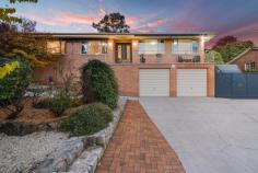  30 Huelin Circuit Flynn ACT 2615 Perfectly positioned in a peaceful pocket of Flynn, this gorgeous property is set on the high side of the street capturing views from every window. Offering a generous floorplan with the flexibility to accommodate extended or growing families. Complete with immaculate landscaping to the front and rear, four beautiful bedrooms, three great sized living areas and much more to offer. It is evident that this quality property has been well kept over the years and presents an attractive opportunity for those looking to settle down for many years to come. With the advantage and convenience of highly regarded schools, sports fields and local shops all within walking distance or a short drive from home, Flynn's family friendly locale is sure to be sought after. Perfectly positioned in Flynn is this gorgeous family home Generous four bedroom floorplan spread across one level Formal living and dining rooms look across the lovely rear garden Kitchen has great storage, breakfast bar and quality appliances Open plan family/meals area flows from the kitchen through to the yard All four bedrooms are a nice size and have built-in robes Main bedroom is expansive and includes own ensuite Main bathroom has separate toilet and includes bathtub Ducted heating throughout Reverse cycle heating and cooling unit in family room Newly installed double glazing Covered deck perfect for outdoor entertaining Immaculately kept front and back gardens An array of established fruit trees including cherry, apricot, peach, apple, pear, lemon, feijoa, kumquat and mulberry Oversized double garage with storage space and access to the backyard Optional along side parking for caravan or boat with gate 6.6kw solar system installed, includes 50 cent kilowatt feed in tariff Great schools and public transport options available within the area Local parks and natural reserves all within the surrounding area A short drive to Belconnen Town Centre Walk into Melba Local Shops, Café Mame and Charnwood Shopping Centre Mount Rogers Nature Reserve close by Three water tanks connected to guttering system Living area 163m2 Garage 57m2 Block size 882m2 