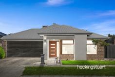  4 Greyfriars La Wollert VIC 3750 $700,000 - $750,000 A world of modern refinement and family-centric 4 Bedroom home, with two living spaces ensuring no shortage of room for family gatherings, relaxation or entertaining. A kitchen features gas cooking, a dishwasher, a walk-in pantry and a thoughtfully placed laundry, providing every culinary essential at your fingertips. Shifting life outdoors, glass sliding doors give access to the covered decked alfresco, offering a spacious outdoor entertaining area ideal for alfresco living and an easy-care yard primed for kids to play.   This remarkable house features :-   - Master Bedroom with ensuite shower, stone benchtop and walk-in robe - Other additional Bedrooms with built-in robes. - Central Bath with bathtub, shower and vanity. - Heaps of storage space with walk in linen. - Butler's Pantry - Quality fittings - Remote-controlled Double Garage - Heating and Cooling. - Open living and dining area. -  Stylish Kitchen with 900mm Cooktop and rangehood - Dishwasher - Splashback in the kitchen. - High Ceilings and High Doors - Waterfall Stone Benchtop in kitchen, bathrooms  - High-quality Fixtures and Fittings throughout. - Low-maintenance landscaped front and rear yards . -Impressive Facade It is an address perfectly positioned for convenience and growth. A place where you will take pride in your community and where your neighbors will become your friends. 