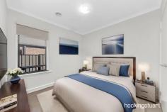  4 Greyfriars La Wollert VIC 3750 $700,000 - $750,000 A world of modern refinement and family-centric 4 Bedroom home, with two living spaces ensuring no shortage of room for family gatherings, relaxation or entertaining. A kitchen features gas cooking, a dishwasher, a walk-in pantry and a thoughtfully placed laundry, providing every culinary essential at your fingertips. Shifting life outdoors, glass sliding doors give access to the covered decked alfresco, offering a spacious outdoor entertaining area ideal for alfresco living and an easy-care yard primed for kids to play.   This remarkable house features :-   - Master Bedroom with ensuite shower, stone benchtop and walk-in robe - Other additional Bedrooms with built-in robes. - Central Bath with bathtub, shower and vanity. - Heaps of storage space with walk in linen. - Butler's Pantry - Quality fittings - Remote-controlled Double Garage - Heating and Cooling. - Open living and dining area. -  Stylish Kitchen with 900mm Cooktop and rangehood - Dishwasher - Splashback in the kitchen. - High Ceilings and High Doors - Waterfall Stone Benchtop in kitchen, bathrooms  - High-quality Fixtures and Fittings throughout. - Low-maintenance landscaped front and rear yards . -Impressive Facade It is an address perfectly positioned for convenience and growth. A place where you will take pride in your community and where your neighbors will become your friends. 