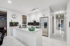  12 Concord Way Andrews Farm SA 5114 $569,000-$609,000 Step into luxury living with this impeccably designed 4-bedroom, 2-bathroom home located in the sought-after suburb of Andrew's Farm. Boasting a contemporary black and white colour scheme, this home exudes elegance and sophistication. As you enter, you are greeted by sleek tiles that flow seamlessly throughout the main traffic areas, while plush carpeting adds warmth and comfort to the lounge and bedrooms. The home features stunning feature walls, LED downlighting, plantation shutters, and an abundance of natural light that creates a welcoming ambiance. The heart of the home is the open-plan kitchen, dining, and living space, perfect for entertaining guests or relaxing with family. The kitchen is a chef's dream, with ample cupboard and bench space, overhead storage, gas cooktop, oven, rangehood, dishwasher, double sink, microwave alcove, pantry, and a breakfast bar adorned with a stylish black tiled splashback. The bedrooms are generously sized and all feature built-in robes, with the master bedroom complete with an ensuite and walk-in robe – sure to treat the new homeowners. Ceiling fans are installed in bedrooms 1, 2, and 3 for added comfort. The fourth bedroom can also be used as a study, offering flexibility to suit your lifestyle. Additional features of this home include: - A second lounge room. - A main bathroom with a separate toilet servicing the bedrooms and living areas. - Outdoor entertaining space with a verandah. - Gas heating and ducted evaporative cooling - Low-maintenance gardens. - A laundry with linen press and direct backyard access. - A shed for extra storage. - Double garage for secure parking. 12 Concord Way boasts a plethora of amenities conveniently located just a stone's throw away. For shopping and dining options, residents can head to nearby Munno Para Shopping City, where a variety of retail stores, supermarkets, cafes, and restaurants cater to every need. Stay active and enjoy the outdoors at the nearby Andrews Farm Community Park, perfect for picnics, leisurely walks, or sports activities. Families with children will appreciate the proximity to local schools such as Andrew's Farm Primary School and Mark Oliphant College. Commuting is a breeze with easy access to public transportation options including bus stops and the Munno Para Train Station, ensuring seamless connectivity to surrounding suburbs and the city. With a range of amenities at your doorstep, 12 Concord Way offers the perfect blend of convenience and lifestyle for its residents. 