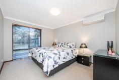  16 Fletcher Road Lesmurdie WA 6076 $989,000 Set in this PEACEFUL & QUIET location overlooking beautiful Seaton Park (with its pretty creek, walk trails, playground), is this beautifully renovated & immaculately kept 4-bedroom 2-bathroom brick home on a MINIMAL CARE & fully landscaped 1,503m² block. Featuring 2 separate living areas, a galley-style kitchen with granite bench-tops & generous cupboard storage spaces, good-sized bedrooms, a massive alfresco area complete with a built-in barbeque area & fire pit, this gorgeous property will suit a myriad of buyers: Those who love to entertain - huge alfresco area and the landscaped gardens provide a beautiful backdrop for those larger parties / family gatherings; The young family - plenty of lawned area for the kids to play and there is also the playground across the road! The family with older kids - the master bedroom is conveniently located at opposite ends of the house from 2 other bedrooms, with parking space for additional cars. The downsizer - for those of you looking to downsize to a smaller & easy-care block but not wanting to compromise on the size of the house. There is absolutely no work required here - just move in and enjoy all that this gorgeous property has to offer. So call Emily Tan or Angela Padula now to view & secure this gorgeous property! Property Highlights: beautiful timber-look flooring 4 great-sized bedrooms 2 bathrooms formal lounge overlooking the park open-plan family, dining & kitchen galley-style kitchen with granite tops, dishwasher, 900mm oven & pantry massive alfresco area shaded area at the front of the house for relaxing & enjoying park views reverse-cycle air-conditioning slow-combustion wood heating a 3.85kW photovoltaic system (solar panels) security system 3 garden sheds landscaped & terraced backyard with built-in fire pit & seating double garage (with extra height clearance) additional parking space for a caravan or boat 1,503m² minimal care block great central location, within an easy walk to shops and public transport, and close to local schools including St Brigid's College and Kalamunda Christian School approximately 15km to Perth airport and 25km to Perth CBD 