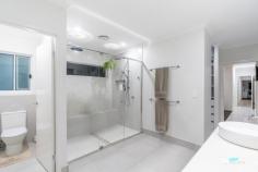  1 St Clair St Ashfield QLD 4670 $1,149,000 Introducing the epitome of luxury living! This stunning 4-bedroom residence is a true gem, boasting not only a “Perfect” floor plan including 2 bathrooms, a separate media room, and open plan living but also built-in robes throughout, a convenient mudroom, and a built-in office with cabinetry for seamless organization. Step into the ensuite oasis featuring a dual shower and dual vanity with a shower bench seat, all adorned with exquisite stone benches. The main bathroom also offers a touch of elegance with its stone bench, arched mirror, and hobbed bathtub, perfect for unwinding after a long day. The heart of the home, the kitchen, is a chef’s dream come true with top-of-the-range Electrolux appliances including 2 ovens, a built-in microwave, and a 900mm gas cooktop. Enjoy the generous 40mm waterfall island and 20mm stone benches, along with a convenient bar area for entertaining guests. Not only does this stunning residence offer luxurious amenities, but it also provides breath-taking views of the outdoor paradise from the comfort of the living areas. The main viewing window frames the picturesque pool area, allowing natural light to flood the space and seamlessly blend indoor and outdoor living. Imagine relaxing in the living room or preparing a meal in the kitchen while being captivated by the serene beauty of the pool and landscaped gardens. Other notable features include a built-in BBQ connected to house gas, a huge 10kw solar inverter, an electric fireplace, security cameras, Ali view screens, Daikin Ducted Air-conditioning, epoxy floor main garage, and a spacious 8x7m shed with 3.2m high clearance, electric roller door, fully lined walls, and built-in shelving. Embrace outdoor living with the “Stunning” magnesium-heated concrete pool and heated spa, surrounded by lush, landscaped gardens and fruit trees. The low-maintenance backyard even includes a 4-hole putt putt course for endless entertainment. All gardens and lawns are irrigated and controlled remotely. Enjoy the convenience of outdoor surround sound speakers in the alfresco and pool areas, making every gathering a memorable one. Don’t miss out on the opportunity to call this exquisite residence your own! Positioned in the well-appointed and new Brookfield Estate and surrounded by other quality homes this property is ‘Built to a standard, not a budget’. This residence truly offers a lifestyle of unparalleled elegance and tranquillity. Book your viewing today and experience the epitome of luxury living first-hand! Conveniently located: – 2.5km to Kepnock High School – 2.9km to Kepnock Town Centre (Woolworths) – 4.3km to St Lukes Anglican School – 6.7km to Bundaberg CBD – 11km to Bargara Beach 