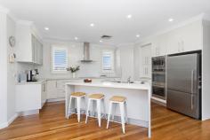  25 Railway Avenue Minnamurra NSW 2533 $2,280,000 - $2,380,000 This spectacular master-built home is both a testament to its thoughtful design and superb craftsmanship. Nestled in the magnificent and highly sought after coastal village of Minnamurra with the lure of a morning swim or kayak less than 200m walk from your front door, you will begin to appreciate why this location is so tightly held. With nothing left to do and no expense spared, you will get to enjoy multiple separate living areas, a gourmet kitchen with stone benchtops and quality appliances that flows effortlessly to the outdoor entertaining alfresco area and low maintenance level yard complete with sparkling inground pool. As the popular host of this home, you will never feel left out as you entertain with the well-planned kitchen ideally located adjacent to the living, dining, outdoor and pool areas. This substantial home offers chic coastal decor, Blackbutt timber flooring, white timber plantation shutters, amazing storage throughout the home as well as in the spacious double garage, 3 bathrooms in total plus powder room, study/dressing room, workshop area and so much more. Not only is this home impressive in style and quality, but the village-like atmosphere is a rare find on the NSW coast. Immerse yourself in the ability to relax and enjoy the easy-going lifestyle you have always dreamt of. Take your pick of activities with surfing, walking, swimming, the pristine river, Mystics beach, golf course, proximity to the train station, primary school and well renowned Minnamurra café all walking within distance of your front door. You would be hard pressed to find a better location on the south coast. 