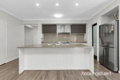  4 Greyfriars La Wollert VIC 3750 $700,000 - $750,000 A world of modern refinement and family-centric 4 Bedroom home, with two living spaces ensuring no shortage of room for family gatherings, relaxation or entertaining. A kitchen features gas cooking, a dishwasher, a walk-in pantry and a thoughtfully placed laundry, providing every culinary essential at your fingertips. Shifting life outdoors, glass sliding doors give access to the covered decked alfresco, offering a spacious outdoor entertaining area ideal for alfresco living and an easy-care yard primed for kids to play.   This remarkable house features :-   - Master Bedroom with ensuite shower, stone benchtop and walk-in robe - Other additional Bedrooms with built-in robes. - Central Bath with bathtub, shower and vanity. - Heaps of storage space with walk in linen. - Butler's Pantry - Quality fittings - Remote-controlled Double Garage - Heating and Cooling. - Open living and dining area. -  Stylish Kitchen with 900mm Cooktop and rangehood - Dishwasher - Splashback in the kitchen. - High Ceilings and High Doors - Waterfall Stone Benchtop in kitchen, bathrooms  - High-quality Fixtures and Fittings throughout. - Low-maintenance landscaped front and rear yards . -Impressive Facade It is an address perfectly positioned for convenience and growth. A place where you will take pride in your community and where your neighbors will become your friends. 