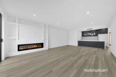  40 Simmental Rd Wollert VIC 3750 $695,000 - $720,000 A World Of Modern Refinement And Family-Centric 4 Bedroom Home.   This Remarkable House Features :-   - Master Bedroom With Ensuite Shower, Stone Benchtop and Walk-In Robe - Other Additional Bedrooms With Built-In Robes. - Fully Tiled Central Bath - Heaps Of Storage Space With Walk In Storage. - Quality Flooring - Remote-Controlled Double Garage - Heating And Cooling. - Downlights Throughout - Open Living And Dining Area. -  Stylish Kitchen With 900mm Cooktop And Rangehood - Dishwasher - Splashback In The Kitchen. - High Ceilings And High Doors - Stone Benchtop In Kitchen, Bathrooms And Laundry. - High-Quality Fixtures And Fittings Throughout. - Low-Maintenance Landscaped Front And Rear Yards . - Exposed Aggregate Driveway -Impressive Facade It Is An Address Perfectly Positioned For Convenience And Growth. A Place Where You Will Take Pride In Your Community And Where Your Neighbors Will Become Your Friends. 