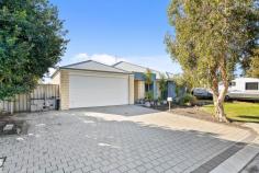  17 Vaucluse Way Coodanup WA 6210 $549,000 This low maintenance home offers a harmonious blend of comfort and style, perfect for families or investors alike. As you step inside, you'll be greeted by the open-plan living space that is generously sized, bathed in natural light, and equipped with a reverse cycle split system air conditioner for year-round comfort.  The heart of the home lays within the kitchen, a central hub, complete with a breakfast bar, ample cabinetry, and stainless steel appliances. The lounge and dining areas seamlessly connect to the alfresco space, creating the perfect flow for entertaining.  The master bedroom, located at the front of the home, is private and features its own reverse cycle air-conditioner, a walk-in robe, and a spacious en-suite with a vanity basin, shower, and separate toilet.  Three additional bedrooms, each with built-in robes, offer comfortable living spaces. The family bathroom includes a bath, shower, vanity basin, and a separate toilet adjacent to the laundry. Outdoor entertaining is effortless with an alfresco area, and a backyard perfect for children and pets with plenty of space and lawn. Enjoy roller door access from the rear of the double garage and plenty of driveway for additional parking.  This property offers an unbeatable lifestyle, just moments to the Peel Estuary, perfect for water activities such as crabbing, boating and nature walks, and is conveniently located a short drive from schools, shops, and amenities.  