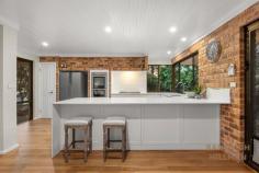 2 Matsen Cl Booragoon WA 6154 Positioned in one of the quietest cul-de-sac streets in Booragoon, with just a quick stroll to Len Shearer Reserve and Westfield Booragoon Shopping Centre this single level family home, built by renowned builder Zorzi, is newly renovated and will appeal to a wide variety of buyers, especially being within the Booragoon Primary School and Applecross Senior High School catchment areas. With an open plan layout, multiple entertainment areas and quality finishings throughout, this home has timeless charm and character, while still enjoying the modern luxuries of contemporary living. As you step through the stained-glass entrance you will be pleasantly greeted by the French Oak timber flooring which leads to a generously sized front living and dining room. Expertly built to emphasise natural light, the room is fitted with multiple large windows with remote control roller security shutters for your convenience. The sunken lounge is in the heart of the home and provides a spacious second area to entertain guests, or for family to relax. The newly renovated kitchen boasts Caesarstone benchtops with a waterfall feature, a five burner Artusi gas cook top, dual basin sink with a retractable tap, breakfast bar and sliding window, allowing food and drinks to be served directly to the outdoor entertainment and swimming pool area. The master retreat is large and is complete with a large walk-in wardrobe. Plantation shutters open to a sliding glass door, providing views over the pool, water feature and gardens from the comfort of your bed. The master ensuite features a glass shower, vanity with under cupboard storage and a separate powder room for convenience. The other three bedrooms share the main bathroom with a shower and separate bathtub. The outdoor entertainment area is a private oasis, surrounded by lush tropical mature gardens, providing a relaxing space to enjoy and entertain. The landscaped gardens are fully reticulated via a bore and all garden beds also have built in lighting, which creates an amazing show at night. There is a featured rock waterfall which runs gracefully into the glistening waters of the pool. Furthermore, there is a second back yard with spacious lawn area, ideal for children to play and pets to roam. In addition to the double lock up garage there is plenty of parking on site which could accommodate extra vehicles as well as space of a caravan or boat parking which is a benefit of the highly sought after dual street frontage. Other features of the property include, air-conditioning throughout, gas heating, solar panels, app-controlled lighting and reticulation. Its central location, with ease of access to public transport and makes it an ideal family home.  