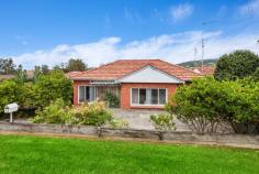  18 Kaleula Crescent Kiama NSW 2533 $1,380,000 - $1,450,000 Offering an extremely large land size for residential Kiama of 935m² (approx), the garden features a retained access to Ocean Road, your gateway to East's Beach. With the yard acting as your blank canvas, there is a plethora of space available to create your dream backyard. With an already-established treeline on either side of the property, the privacy on hand is abundant. Alternatively, with a street frontage of 15.2m² paired with the large block, this property may also act as a fantastic development opportunity for a subdivision or dream home rebuild (s.t.c.a). The home while built in the 1960s has been updated throughout the years to offer modern amenities, with its greatest addition being the large sunroom/family room to the rear of the property. Accommodation includes four bedrooms spread across two levels, with a second living/media/games room downstairs. A major benefit of this home is the fantastic access to East's Beach, being only 200m (approx) from the rear of the property. Further to this, take a near 450m (approx) walk to the Tingira Crescent shopping strip and enjoy the well-loved local businesses, from coffee shops and restaurant/bar to Olive Pilates studio. 