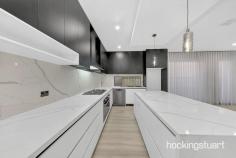  7 Taggiasca Dr Wollert VIC 3750 $695,000 - $720,000 A World Of Modern Refinement And Family-Centric 4 Bedroom Home.   This Remarkable House Features :-   - Master Bedroom With Ensuite Shower, Stone Benchtop and Walk-In Robe - Other Additional Bedrooms With Built-In Robes. - Fully Tiled Central Bath - Heaps Of Storage Space With Walk In Storage. - Quality Flooring - Remote-Controlled Double Garage - Heating And Cooling. - Downlights Throughout - Open Living And Dining Area. -  Stylish Kitchen With 900mm Cooktop And Rangehood - Dishwasher - Splashback In The Kitchen. - High Ceilings And High Doors - Stone Benchtop In Kitchen, Bathrooms And Laundry. - High-Quality Fixtures And Fittings Throughout. - Low-Maintenance Landscaped Front And Rear Yards . - Exposed Aggregate Driveway -Impressive Facade 