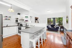  18 Kaleula Crescent Kiama NSW 2533 $1,380,000 - $1,450,000 Offering an extremely large land size for residential Kiama of 935m² (approx), the garden features a retained access to Ocean Road, your gateway to East's Beach. With the yard acting as your blank canvas, there is a plethora of space available to create your dream backyard. With an already-established treeline on either side of the property, the privacy on hand is abundant. Alternatively, with a street frontage of 15.2m² paired with the large block, this property may also act as a fantastic development opportunity for a subdivision or dream home rebuild (s.t.c.a). The home while built in the 1960s has been updated throughout the years to offer modern amenities, with its greatest addition being the large sunroom/family room to the rear of the property. Accommodation includes four bedrooms spread across two levels, with a second living/media/games room downstairs. A major benefit of this home is the fantastic access to East's Beach, being only 200m (approx) from the rear of the property. Further to this, take a near 450m (approx) walk to the Tingira Crescent shopping strip and enjoy the well-loved local businesses, from coffee shops and restaurant/bar to Olive Pilates studio. 