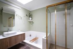  9 Mt Piddington Road Mount Victoria NSW 2786 $990,000 - $1,089,000 For those seeking a home that provides peaceful solace, living spaces to suit a growing family and colourful gardens hidden from neighbouring properties then this could be your ideal one. With ducted heating, a cosy slow combustion fire, newly installed reverse cycle air conditioning and solar panel efficiencies there is much to take advantage of. A beautiful full length deck overlooking the gardens below is a place for relaxed socialising or quiet reflection with birdsong all around. Only approximately 800m to the local cafes, train station and the iconic Mount Vic Flicks, this one is certainly worth adding to your priority viewing list. Breakdown of Features: Fully fenced with attractive gated entry; double garage with excellent workspace to rear Generous additional under house and garage storage offering standing height accessibility Established flora with pretty garden 'rooms' for exploration and space for chickens to roam Main entrance leading down to bedroom accommodation and separate zoned living areas Ducted gas heating; reverse cycle a/c; main living with s/c wood fire and tree canopy views Spacious open plan kitchen, dining and casual living with sliding door out to full length deck Master bedroom with deck access, walk-through robe and neatly presented shower ensuite Plenty of natural light throughout, built-in storage in bedrooms 2 and 3, hallway linen closet Upgraded family bathroom with sunken bath, separate shower; practical separate WC Excellent position within easy walk/800m of great local cafes; city train links & Mt Vic Flicks 