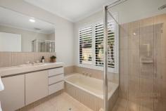  2 Matsen Cl Booragoon WA 6154 Positioned in one of the quietest cul-de-sac streets in Booragoon, with just a quick stroll to Len Shearer Reserve and Westfield Booragoon Shopping Centre this single level family home, built by renowned builder Zorzi, is newly renovated and will appeal to a wide variety of buyers, especially being within the Booragoon Primary School and Applecross Senior High School catchment areas. With an open plan layout, multiple entertainment areas and quality finishings throughout, this home has timeless charm and character, while still enjoying the modern luxuries of contemporary living. As you step through the stained-glass entrance you will be pleasantly greeted by the French Oak timber flooring which leads to a generously sized front living and dining room. Expertly built to emphasise natural light, the room is fitted with multiple large windows with remote control roller security shutters for your convenience. The sunken lounge is in the heart of the home and provides a spacious second area to entertain guests, or for family to relax. The newly renovated kitchen boasts Caesarstone benchtops with a waterfall feature, a five burner Artusi gas cook top, dual basin sink with a retractable tap, breakfast bar and sliding window, allowing food and drinks to be served directly to the outdoor entertainment and swimming pool area. The master retreat is large and is complete with a large walk-in wardrobe. Plantation shutters open to a sliding glass door, providing views over the pool, water feature and gardens from the comfort of your bed. The master ensuite features a glass shower, vanity with under cupboard storage and a separate powder room for convenience. The other three bedrooms share the main bathroom with a shower and separate bathtub. The outdoor entertainment area is a private oasis, surrounded by lush tropical mature gardens, providing a relaxing space to enjoy and entertain. The landscaped gardens are fully reticulated via a bore and all garden beds also have built in lighting, which creates an amazing show at night. There is a featured rock waterfall which runs gracefully into the glistening waters of the pool. Furthermore, there is a second back yard with spacious lawn area, ideal for children to play and pets to roam. In addition to the double lock up garage there is plenty of parking on site which could accommodate extra vehicles as well as space of a caravan or boat parking which is a benefit of the highly sought after dual street frontage. Other features of the property include, air-conditioning throughout, gas heating, solar panels, app-controlled lighting and reticulation. Its central location, with ease of access to public transport and makes it an ideal family home.  