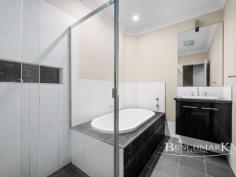  10 McKenzie Blvd Gregory Hills NSW 2557 Welcome to a stunning 4-bedroom property brought to you by Benchmark National, where your dream home awaits. This beautiful residence offers an exceptional blend of comfort, style, and convenience, perfectly suited for families and discerning buyers seeking a prime location and modern amenities. Key Features: Spacious Bedrooms: Enjoy four generously sized bedrooms, providing ample space for the whole family. The master suite is a true retreat, featuring a luxurious ensuite and a spacious walk-in wardrobe. Separate Living Area: The separate living area offers a versatile space for relaxation and entertainment, ensuring everyone in the family has their own space. Double Garage: A double garage provides secure parking for your vehicles and additional storage space. Outdoor Pergola: Step outside to your private outdoor pergola area, complete with elegant timber decking. It's the perfect spot for alfresco dining, entertaining guests, or simply unwinding after a long day. Prime Location: Situated within walking distance to local shops, this property offers the convenience of nearby amenities without compromising on privacy and tranquility. Generous Land Size: Set on a substantial 450 sqm block, this property provides a great backyard for children to play, gardening enthusiasts to thrive, or for hosting memorable gatherings. Practical Floor Plan: The house boasts a well-designed floor plan that maximizes space and functionality, ensuring comfortable and practical living for years to come. Don't miss out on this incredible opportunity to secure a home that perfectly balances modern living with convenience.  