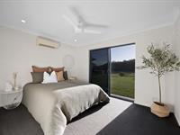  105 Barrow Hill Rd Habana QLD 4740 Location is perfect for lovers of quiet country lifestyle. Imagine the serenity on your very rural retreat of approx. 2.49 acres. Enjoy the sounds of nature - birds chirping and the gentle breezes rustling the leaves, the morning song of the cows and maybe the winnie of the close by horses. Paradise found and approx. an easy 23-minute drive to Mackay CBD. Relish the conveniences of the city while savouring your privacy and maybe your sanity. So what exactly is on offer here? A vast modern low-set home with absolutely everything you would expect in an executive residence. The kitchen forms the 'hub' of this home. Quality custom design, a huge island with feature pendants overhead, stone benches, top quality appliances and sizeable gas cook-top. Family and guests alike will all happily gather here for delicious nibblies and drinks! The seamless transition from inside living to the expansive outdoor entertaining area is priceless. Friday night football or family catch ups will be perfect as this home sprawls for all to meander inside or out. With a peaceful and private view from every window. Who needs curtains when only the trees and cows can see you…. The fresh air is rejuvenating! In the cooler months, toast marshmallows and sip on hot chocolate! Sit around the fire-pit gazing at the flickering red and orange flames. Life just doesn't get better than this! Sleeping zones are fantastic. Naturally the master suite has its own private ensuite, perfect at the end of the day and 'down-time'. Three additional bedrooms have their own family bathroom to cater for the kids or guests. But there is so much more!!! Check out these amazing extras… • A huge 12m x 10m shed with high clearance carport to front & side. • One shed has been converted into a 'Studio/Granny flat'/games room and has all amenities: kitchen, air-conditioning, laundry, toilet and bio-cycle septic. A terrific addition if you have teenagers or extended family. • Bore & tank water x 2 consisting of 40,000 L • Septic system to main residence and 'Studio /Granny flat' • There is a school bus service pickup from the main gate, servicing most inner city Primary and High Schools. This neighbourhood is for the astute buyer and is sure to impress and exceed your expectations. 