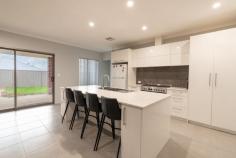  13 Hereford Retreat Byford WA 6122 $699,000 Discover your dream home with this well-designed 4-bedroom, 2-bathroom residence built in 2022, nestled in a serene street opposite a picturesque bush setting. Designed for modern living, it features an enclosed theatre room, a spacious open-plan living area with high ceilings, and a versatile activity/study area. The heart of the home is the fabulous central kitchen, boasting top-of-the-line appliances and elegant stone benchtops. Enjoy the convenience of solar panels, ducted reverse cycle air conditioning, and CCTV cameras for added security. Perfectly located, it's just a short stroll to Byford Adventure Playground and a quick drive to John Calvin School, Byford Secondary College, Serpentine Jarrahdale Community Recreation Centre, and a bustling shopping complex. Viewings are a must! This wonderful home is delightful and is ideal for owner-occupiers and investors. • Ducted reverse cycle air conditioning throughout • Separate living areas including a theatre room and activity/study • Central kitchen with overhead cabinetry, breakfast bar, 900mm cooking appliances, rangehood, double pantry and scullery • Rear master suite with a spacious ensuite and walk-in robe • Double-sized minor bedrooms with double sliding robes • Roller shutters to some of the windows • 3KW solar system • Generous sized backyard for the kids and pets to play • Alfresco area for outdoor dining • Large gate offers side access to the rear 