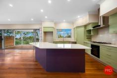  5 Sandra Close Coffs Harbour NSW 2450 $899,000 - $939,000 Elevated and with views, this spacious family home could be the one that you have been searching for. With a great floor plan that could be adapted to suit an array of needs this property offers so many options. Currently configured as a 4 bedroom home with a study and rumpus room this home could easily be converted to a 5 or even 6 bedroom home if required. There are bathrooms on both levels and the main has an ensuite. The spacious, open plan living/dining area has polished timber floors and will certainly impress those with larger families. The modern kitchen overlooks the living area and is great for the entertainer to interact with guests whilst cooking a meal. For those that like to entertain outside, there are multiple options with the main deck leading off the living/dining area through stacker doors that can be opened up to bring the outside in. From this deck there are glorious views out towards the East with a slight glimpse of the ocean through the trees. There is also another deck at the front of the home, off the main bedroom, rumpus room and at yard level is a concrete patio. Storage is abundant in this property with plenty of cupboard space and a large storage area/workshop underneath the house with concrete floor and security roller door. Approximately 5 minutes drive to the Coffs Harbour CBD and close to local schools convenience is a plus. If you've been looking for a large family home in a great area then look no further. 
