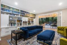  28A Lilian Ave Applecross WA 6153 $3,000,000 Experience unparalleled luxury at 28A Lilian Avenue, Applecross. Come home to space and style with this elegant family home nestled in one of Applecross' most prime pockets. Rarely do you see a residence with such meticulous finishes and opportunities of this stature are few and far between. Gorgeously updated, no expense has been spared in crafting this residence that impeccably balances family living and entertaining with ease. Set only one street back from the Swan River, this abode boasts proximity to renowned schools, cafes and amenities, culminating in a highly sought-after lifestyle! The residence asserts itself from the street with an elegant facade adorned by manicured gardens and climbing vines. You'll be impressed from the start with a gallery-style entrance, luxuriously framed with high ceilings and engineered walnut flooring. The home features a dedicated sitting room, designed as a separate area for social gatherings, talking, reading or enjoying a quiet drink, with French doors. A focal point of the home is the open plan kitchen and dining room, bordered by large windows and bi-fold doors that allow lots of light to enter in addition to vistas of the glistening underground pool. The bespoke kitchen is a chef's dream with stunning cabinetry, a wrap around stone bench top and a premium 'Falcon' oven. The family room seamlessly connects to the exquisite outdoor alfresco area delivering an enviably platform for entertaining. The expansive outdoor area is complete with a sunken outdoor fireplace with built in seating, showcasing the beauty of the established gardens - you'll be the envy of family and friends here! The accommodation of this home is separated from the living area, with the three main bedrooms being positioned on the top floor. The spacious master suite is complete with a balcony, dressing room and a resort-style ensuite. Two well-sized secondary bedrooms, both with robes, are near the primary bathroom. You'll find a study on the ground floor which can easily be used as a fourth bedroom. Property Features: ● Beautiful facade adorned by manicured gardens, hedges and climbing vines ● Secure automated front gate with intercom system ● Engineered walnut flooring ● High ceilings throughout ● Formal lounge upon entry with gas fireplace ● Two bathrooms, all with marble benchtops ● Downstairs powder room ● Glistening underground heated pool perfect for families 