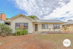  379 Etiwanda Avenue Mildura VIC 3500 Discover this wonderful three bedroom home, perfect for investors and first home buyers alike. Offering a timeless appeal with timber floorboards throughout and elegant ornate cornice work, this neat and tidy home is full of character. The living area features efficient gas heating, while the updated open-plan kitchen/dining area boasts gas cooking and ample storage for all your appliances. The recently updated bathroom features a shower and generous vanity space, alongside a separate toilet and laundry for convenience. Step outside and enjoy the expansive undercover decked verandah, an great spot to simply relax and enjoy the weather. With a tandem carport and a 9.1m x 9.7m (approx.) shed, storage and parking are well catered for. The fully fenced 689m2 (approx.) block also features rear yard access via double gates, evaporative cooling and low maintenance gardens, making this an excellent opportunity for those looking to enter the market or expand their portfolio. With a periodic tenancy already in place at $330 per week - hesitate and you may miss out! 