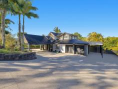  10 Mittelstadt Road Glass House Mountains QLD 4518 Escape to your own private sanctuary with this exceptional property nestled in the picturesque Glass House Mountains. Blending natural beauty with modern comfort, this home is perfect for those seeking a serene lifestyle with ample space and luxury features for both family living and entertaining. Ideally located just a 35-minute drive from the Sunshine Coast City CBD, this home is close to local amenities, schools, and shops, with easy access to major roads and transport links. The property boasts a massive five-bay shed with a large carport and side access, providing versatile space for all your needs. Enjoy breathtaking views of the surrounding landscape and beautifully landscaped gardens filled with native plants. Property Features: Spacious Residence: 4 Bedrooms 3 renovated Bathrooms Large Media Room Huge Games Room Open-plan lounge and dining room Second lounge room upstairs Renovated kitchen with modern finishes Pitched ceiling Ducted A/C upstairs and split system downstairs Double volume entrance hall Outdoor Living: Large entertaining area In-ground saltwater pool Undercover Spa Built-in BBQ Pizza oven and built-in bar Poolside cabana Outdoor office or 5th bedroom Additional Amenities: Five-bay shed with car hoist Large carports with separate driveway access 20-panel solar system (6 kW) 16 undercover car spaces Large Fire pit Don't miss this rare opportunity to own a slice of paradise in the Glass House Mountains. Whether you're looking to relax in luxurious comfort, entertain family and friends, or revel in the natural beauty of the region, 10 Mittlestadt Road offers unparalleled potential and value. Inspect this fantastic home quickly and start envisioning your future in this perfect family and entertainer's home. 