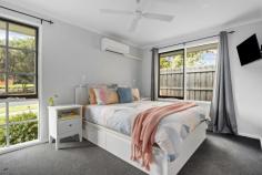  264 Heatherhill Road Frankston VIC 3199 $960,000 - $1,056,000 Capturing views towards Melbourne's CBD from its private first-floor master suite, this beautifully updated 4-bedroom home offers families a premium living experience with formal and informal living zones, a separate parent's retreat and a generous covered alfresco. With an address ensuring every Frankston amenity is within reach, find easy access to public transport, shops and schools. Enhanced with modern interiors, the home opens across an airy layout where the first of two separate living zones introduces a truly family-friendly environment. Keeping true separation between the two entertaining zones tanks to a central hallway door, casual hosting presents with supreme comfort across a dedicated lounge and dining domain, and impressive kitchen complete with 40mm stone benchtops, modern gas cooktop and underbench oven, and dishwasher. Taking summertime hosting outside, a covered deck alfresco encourages outdoor dining where views towards the backyard keep little adventurers within comfortable view. A versatile accommodation design affords choice in master suites, with a ground-floor primary bedroom with walk-in robe and ensuite nestled amongst two secondary bedrooms and a renovated main bathroom. Keeping privacy for parents with older children, the first-floor primary suite provides a peaceful outlook across Port Phillip Bay beyond a parent's retreat, main bedroom, ensuite and 'his and hers' built-in robes. Complete with gas ducted heating, split-system air conditioning throughout and a single carport, this beautifully renovated home sits within easy reach of Kingsley Park Primary School, Wittenberg Reserve Playground, Monash University, Frankston Hospital, and Bayside Shopping Centre. 