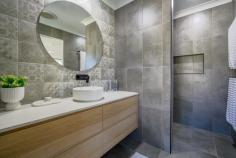  9 Denaid Court Benaraby QLD 4680 $1,200,000 NEARLY NEW: This low-set brick home was built just over three years ago, perfectly designed for modern family living, with a neutral colour scheme throughout, high ceilings, quality fixtures and fittings, sitting proud on a sprawling 8,614m2 which is over two acres. There is an impressive 20m x 9m shed with 4 large roller doors, a double size lean- to carport which is 6m x 9m for additional covered parking. Plus, the shed is equipped with both 10- and 15-amp outlets, a mezzanine floor, a car hoist and there's even a separate shower and toilet block adjacent to the carport for added convenience! Immaculate in every way, inside and outside, and this is what makes this home truly exceptional. Home Features: The kitchen has a 900mm Induction cooktop, Island bench, double sink, dishwasher, walk-in pantry with a coffee station, plus plenty of bench space, and ample soft closing cupboards and drawers. The living, dining and kitchen area is a spacious open plan design with glass louvres to provide stunning views from every angle, and gentle breezes to flow through all year round. Large glass sliding doors open to an expansive undercover area, and seamlessly bring the indoor and outdoor entertaining spaces together, making it just perfect for hosting gatherings or enjoying a quiet evening outdoors. The media room is an ideal retreat for family movie nights, or it can be transformed into a playroom for the kids, plus there is a dedicated separate study nook. The Master bedroom is air conditioned and a super king size room, with an ensuite tiled to the ceiling, double vanity, walk-in shower, and a walk-in robe. There are another three bedrooms, one of them is a king size room, all have built-in robes, air conditioning, while the main bathroom is also tiled to the ceiling and has a separate bath and shower, vanity and a separate toilet. This is an impressive home without doubt, with beautifully manicured gardens and lawns, and a fully fenced separate house yard. An entertaining area thoughtfully designed with concrete bench tops, a place for a pizza oven, seating, a fire pit and lighting, making it a fantastic spot for family and friends to gather!! This property lends itself to those who perhaps want to run a business from home with the extensive shed space, ideal if you have trucks, trailers, extra vehicles or machinery etc, however you may just want to store a caravan, the boat, camping and fishing gear! This gorgeous home offers the perfect combination for families seeking extra space on acreage, modern comforts, and a clean fresh 'Country Lifestyle'. WHY WAIT TO BUILD, WHEN IT'S ALREADY DONE?? Conveniently located only a 15-minute drive to the Gladstone CBD, Tannum Sands Beach and the Boyne River 